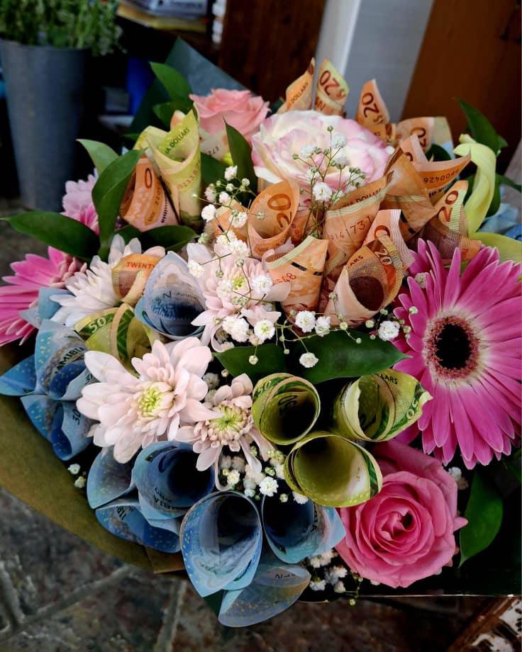 Bouquet with rolled Namibian dollar notes